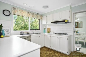 Fridge, stovetop, dishwasher, cookware/dishes/utensils