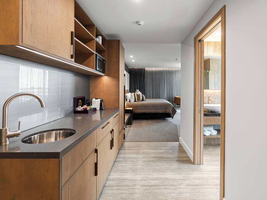 Executive Studio Suite | Private kitchenette | Mini-fridge, microwave, coffee grinder, kitchen islands