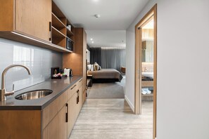 Executive Studio Suite | Private kitchenette | Kitchen islands
