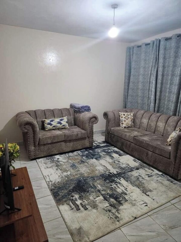 Appartement Confort, balcon, vue jardin | Coin séjour