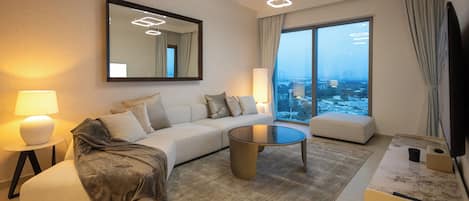 Deluxe-Apartment, Stadtblick | Wohnbereich