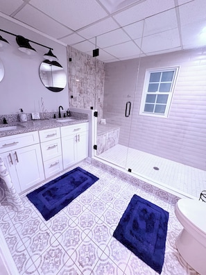 Shower, hair dryer, towels, soap