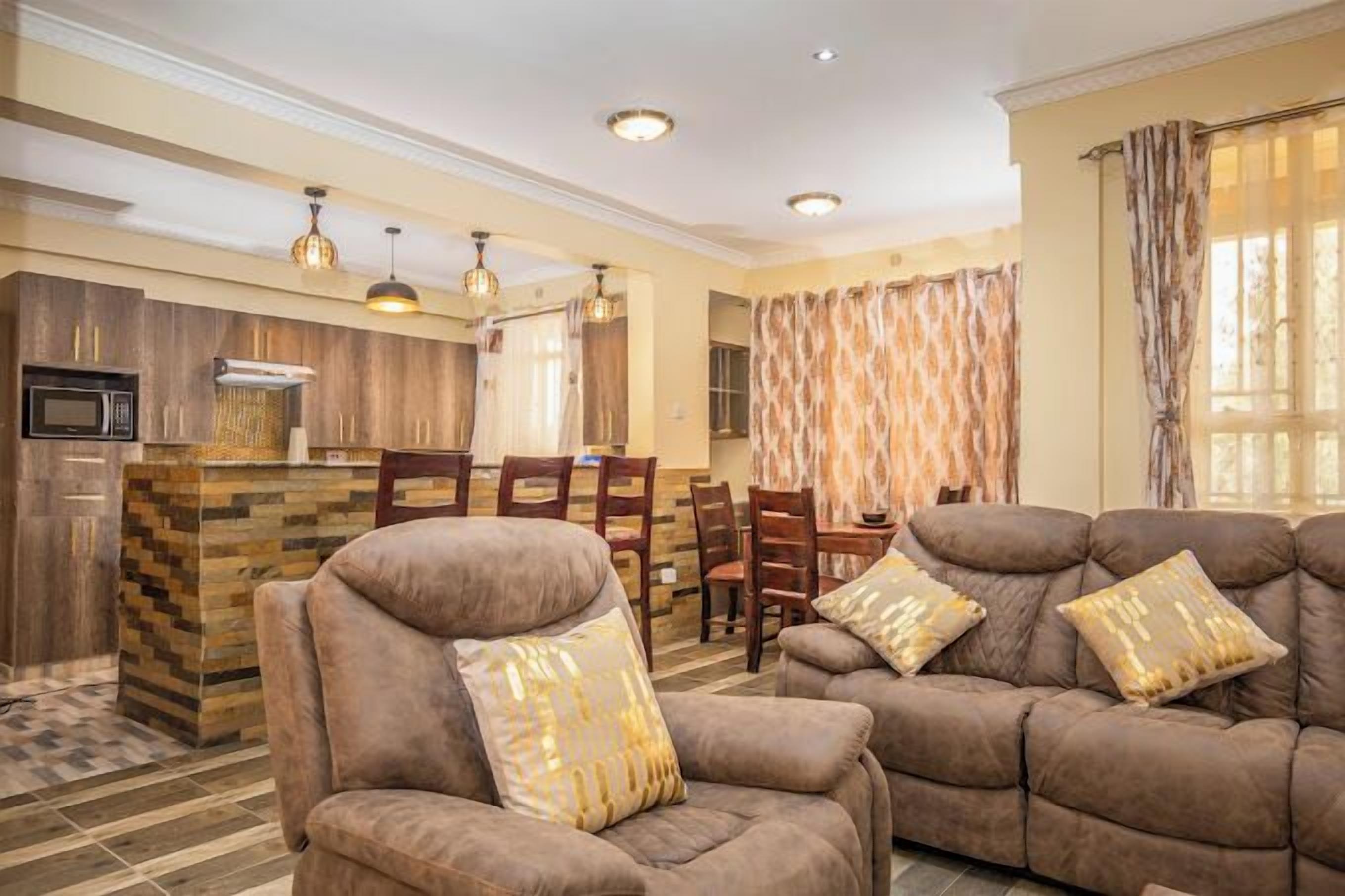 Deluxe Apartment | Living area | 24-inch Smart TV with digital channels