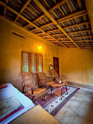 Deluxe Cottage, Garden View | Living area - Nature Tones By BRDGE HOSPITALITY  (Devikolam)