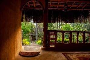Cottage Deluxe, vue jardin | Coin séjour