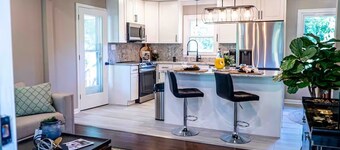 Elegant 2BR Retreat • Spa Showers • Chef Kitchen • Near Hospitals & Parks