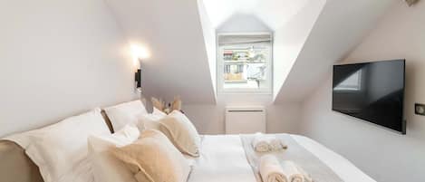 1 habitación, tabla de planchar con plancha, cuna de viaje y wifi