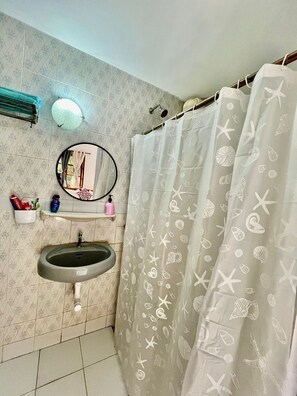 Hair dryer, towels, soap, toilet paper