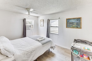 1 bedroom, desk, iron/ironing board, travel crib