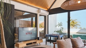 Deluxe Villa, 5 Bedrooms, Private Pool, Pool View | Living area | 65-inch Smart TV with digital channels - Makia Penthouse by Alfred in Bali (Canggu)