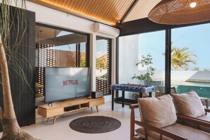 Deluxe Villa, 5 Bedrooms, Private Pool, Pool View | Living area | 65-inch Smart TV with digital channels - Makia Penthouse by Alfred in Bali (Canggu)