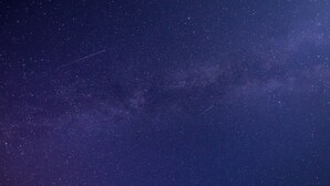 A starry night sky with a visible Milky Way.