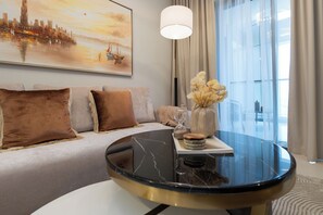 Deluxe Apartment, 2 Bedrooms, Balcony, City View | Living area | 50-cm Smart TV with digital channels - Keyrock Living - Luxury at Aykon Tower (Dubai)