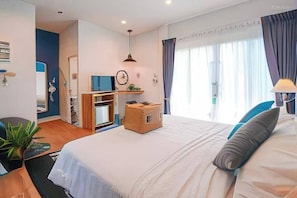 Bungalow Deluxe, vista al jardín | Escritorio, wifi gratis y ropa de cama 