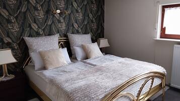 2 slaapkamers, een kluis op de kamer, een strijkplank/strijkijzer