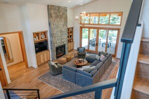 Smart TV, fireplace, foosball, books