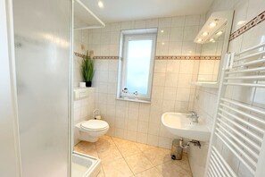 Douche, serviettes fournies