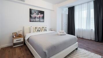 Egyptian cotton sheets, premium bedding, desk, laptop workspace