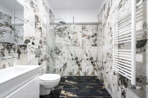 Shower, free toiletries, hair dryer, towels