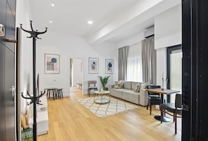 Urban Garden Loft | Living area | 50-inch LED TV with satellite channels