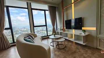 Apartamento superior, 1 quarto, cozinha, vista para a cidade | Vista do quarto