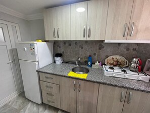 Standard Apartment, Balcony, Garden View | Private kitchen - Melanur Pansiyon (Gokceada)