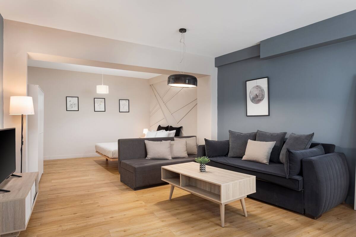 Comfort Suite | Living area | 50-inch Smart TV with satellite channels, Netflix, streaming services