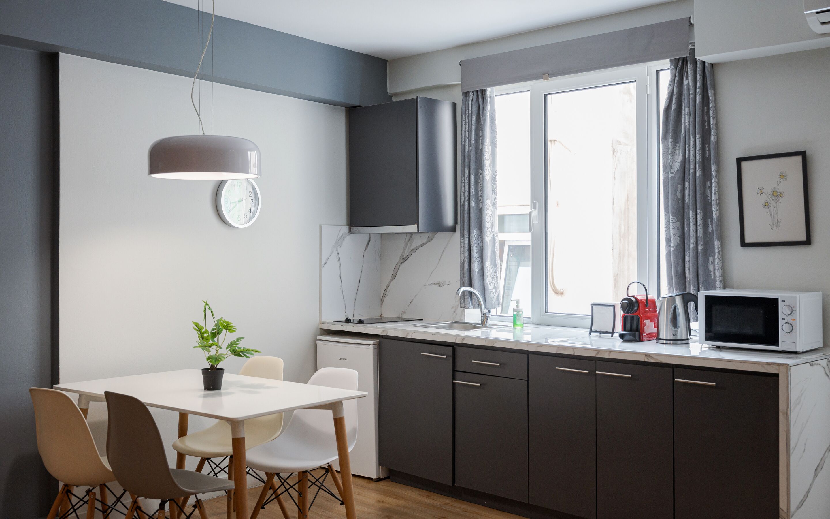 Comfort Suite | Private kitchenette | Full-size fridge, microwave, espresso maker, coffee/tea maker