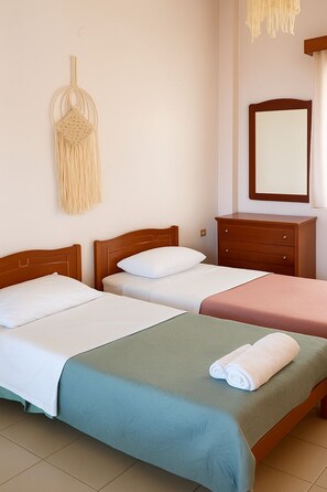 1 غرفة نوم ومكواة/لوح كي وواي فاي وملاءات أسرّة