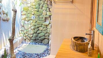 Bidet, towels, soap, toilet paper