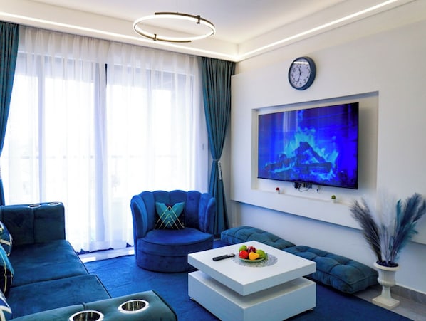 Estudio Deluxe | Área de sala de estar