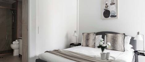 2 habitaciones, tabla de planchar con plancha, wifi y ropa de cama