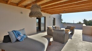 Terrace/patio - Villa Ephelia, relaxation in the olive grove, with sea view,
Pool can be heated. (Asteri)