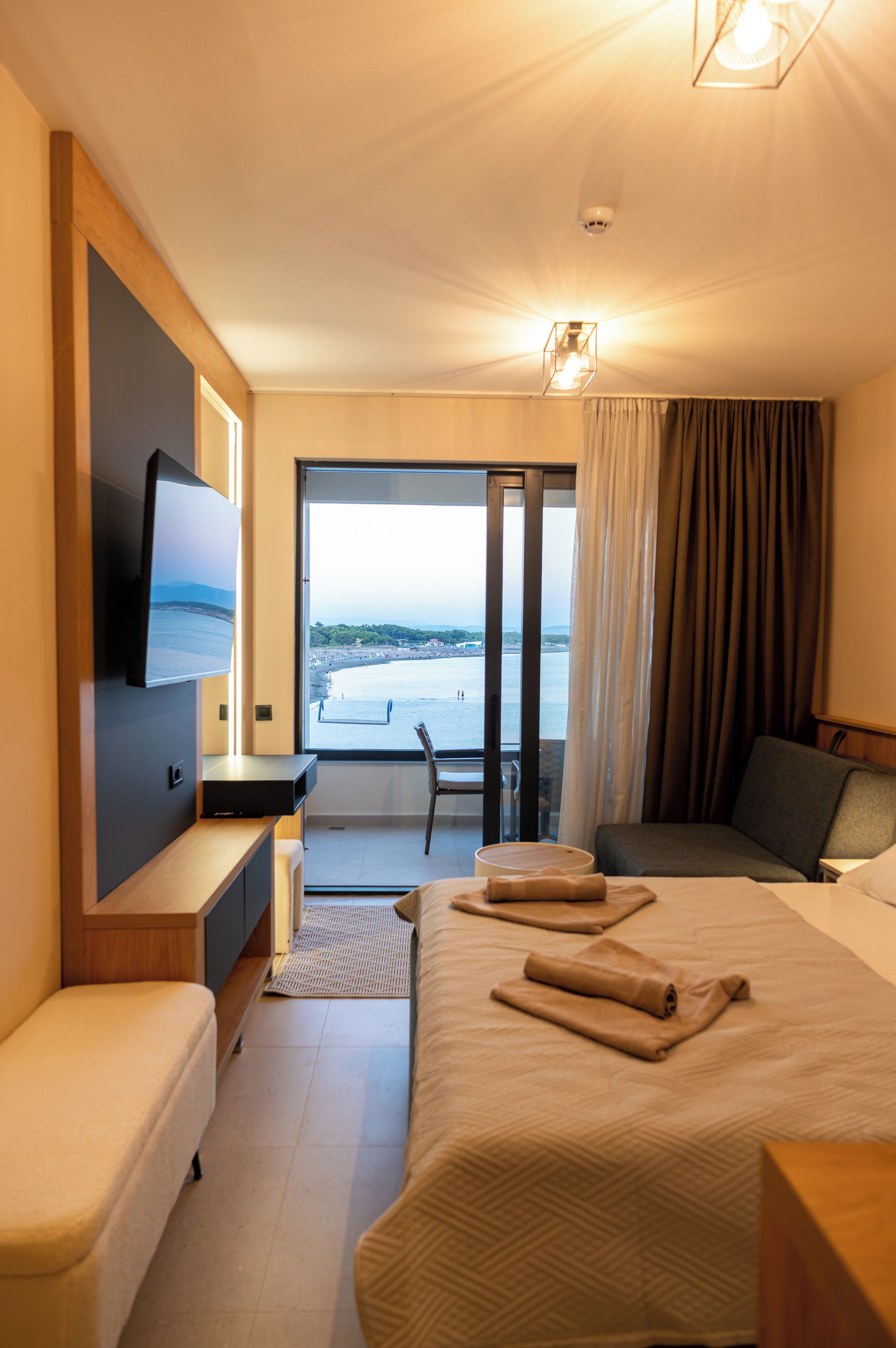 Luxury Room, 1 Queen Bed with Sofa bed | Living area | TV, fireplace, heated floors