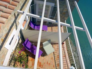 Habitación doble Deluxe, balcón, vista a la laguna | Terraza o patio