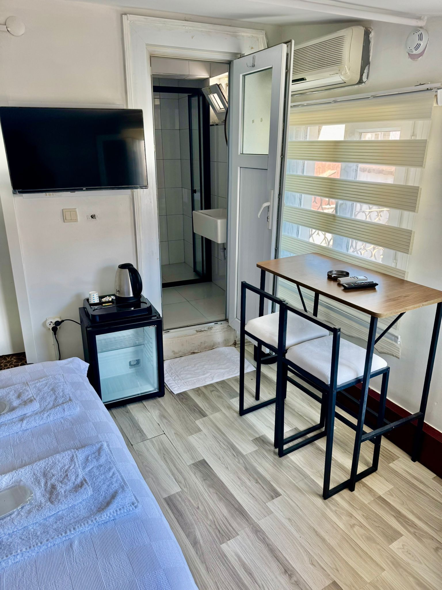 Standard Double Room, City View | Desk, laptop workspace, free WiFi, bed sheets