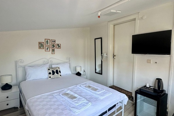 Standard Double Room, City View | Desk, laptop workspace, free WiFi, bed sheets