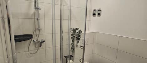 Shower, free toiletries, hair dryer, towels
