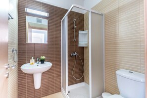 Regadera y secadora de cabello 