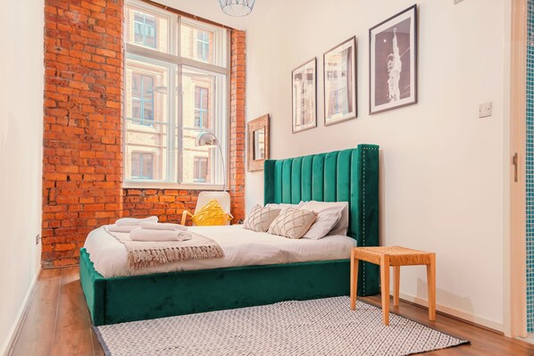 2 slaapkamers, een strijkplank/strijkijzer, gratis wifi, beddengoed