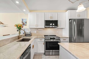 Fridge, microwave, oven, stovetop - The Summit #9E - Top Floor, Remodeled, Oceanfront! (North Myrtle Beach)