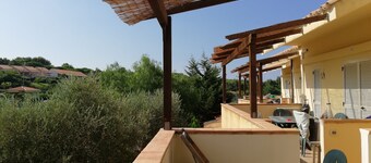 two-level cottage in capopiccolo resort with animation