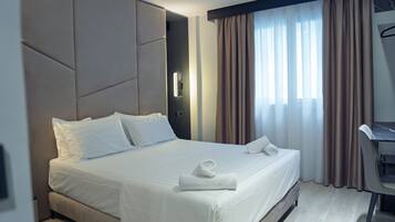 Desk, free WiFi, bed sheets