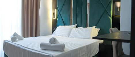Suite estudio | Escritorio, wifi gratis y ropa de cama