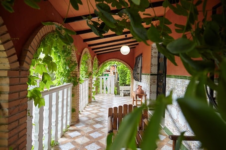 Terrace/patio. Country House 'Los Rosales' with Private Pool and Private Garden