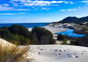 On the beach - Holiday Home 'On The Sea Fenicottero' with Sea View, Private Terrace and Private Garden (S'Ena e Sa Chitta)