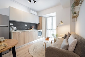 Apartamento, 1 habitación | Zona de estar