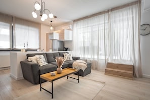 Apartamento, vistas al jardín | Zona de estar