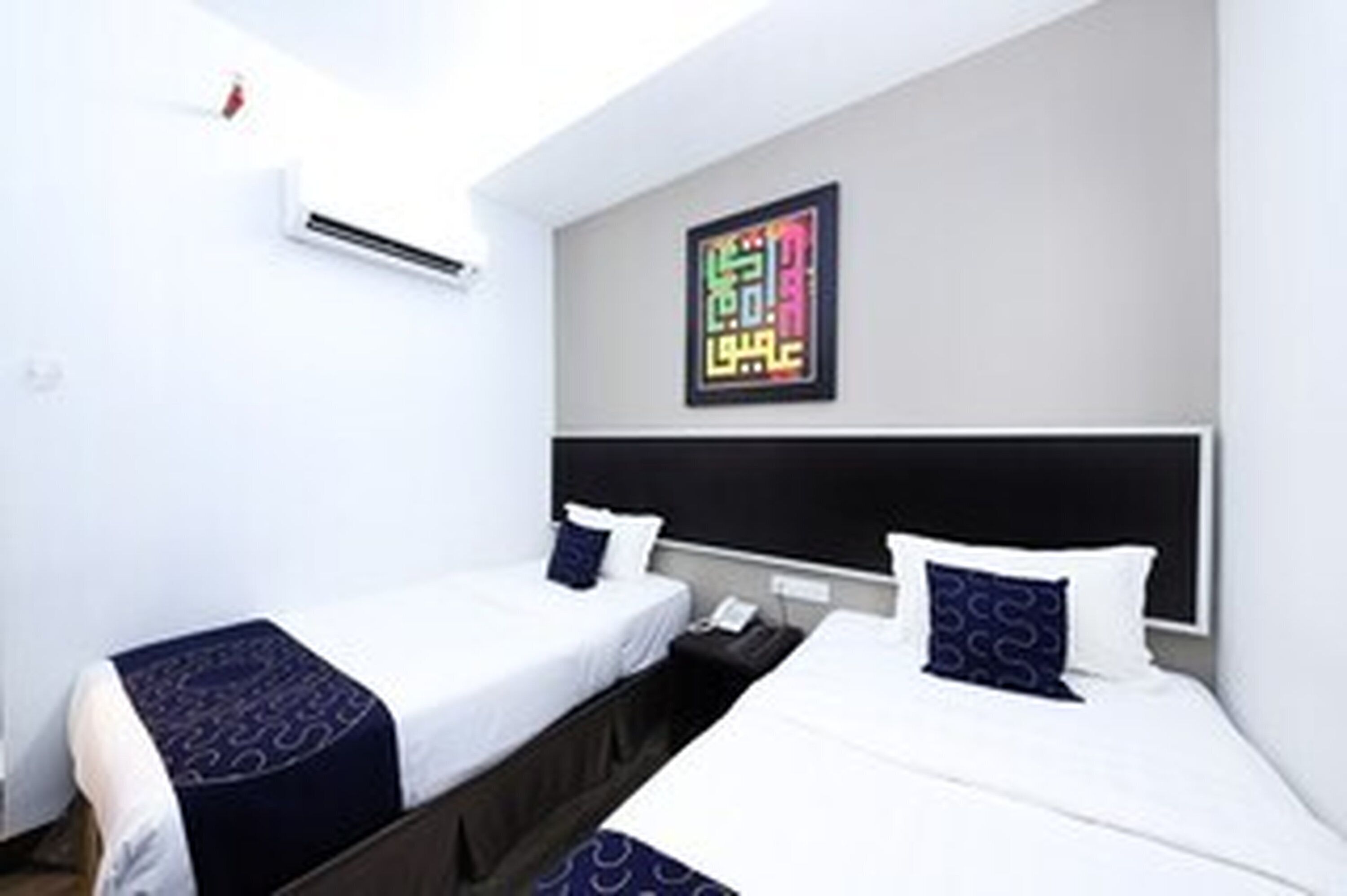 Chambre Standard avec lits jumeaux | Bureau, Wi-Fi gratuit, draps fournis