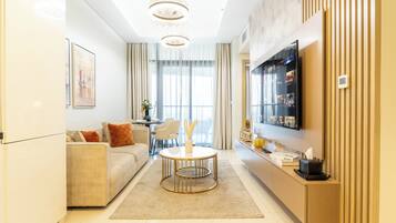 Appartement Deluxe, balcon, vue ville | Coin séjour